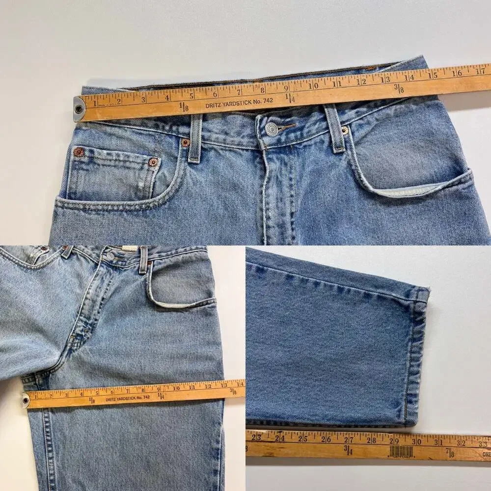 Vintage 90s Levis 560 Loose Tapered Leg Light Wash Blue Denim Jeans 31x30 0432